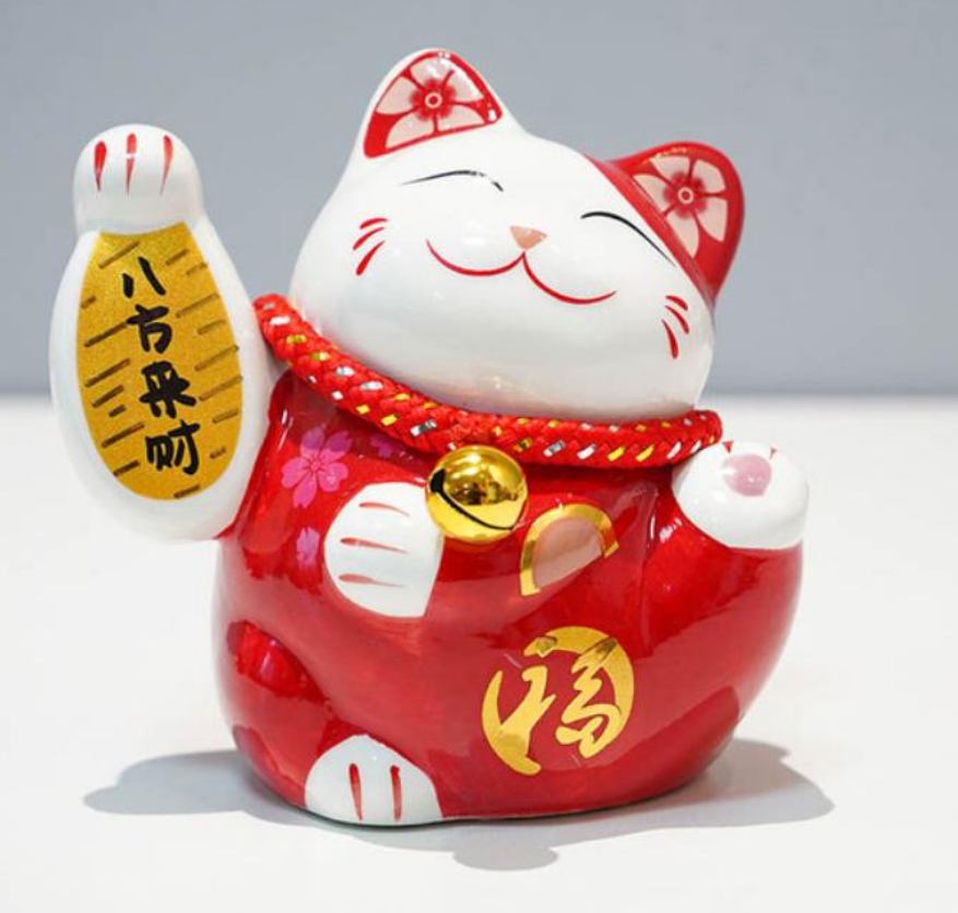Sparschwein in Form einer roten japanischen Katze für Glücksgeld